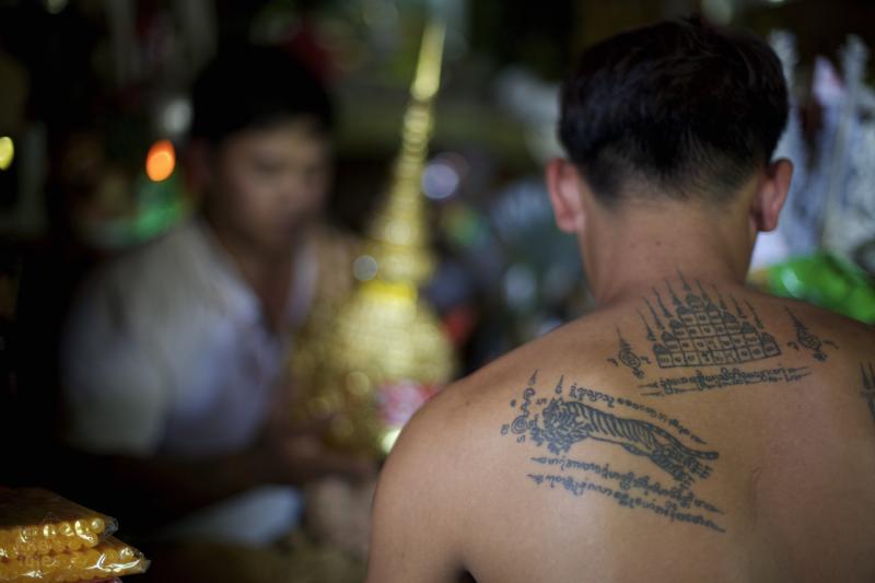 After receiving the tattoos they take part in a solemn ceremony