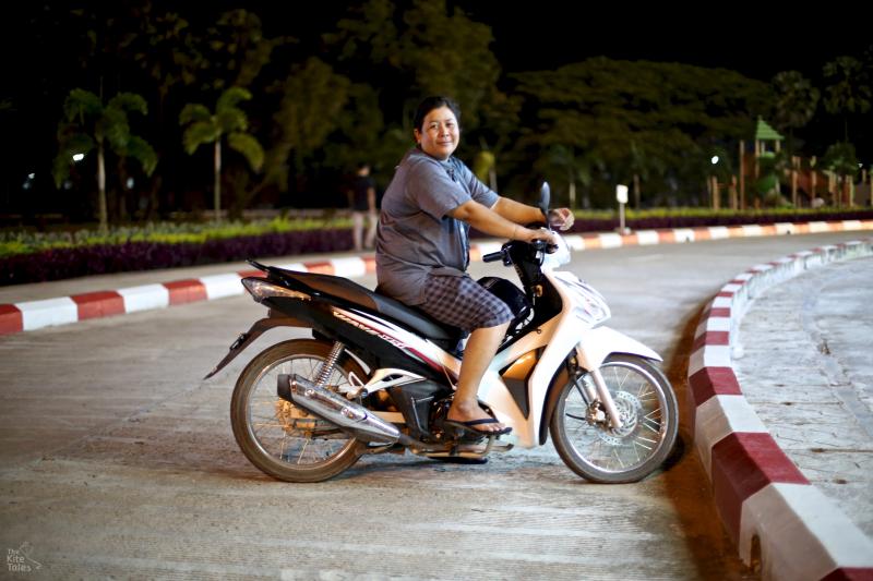 Mya Thet Mu on her motorbike