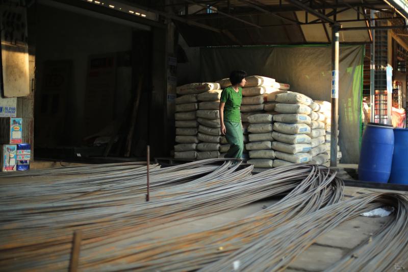 Woman in a Dawei construction shop